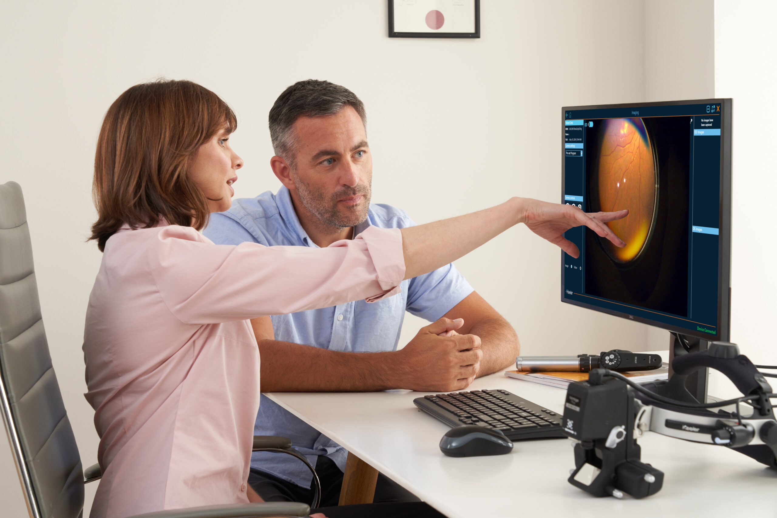 Keeler_BVPD_Clinician and patient reviewing Kinexis software